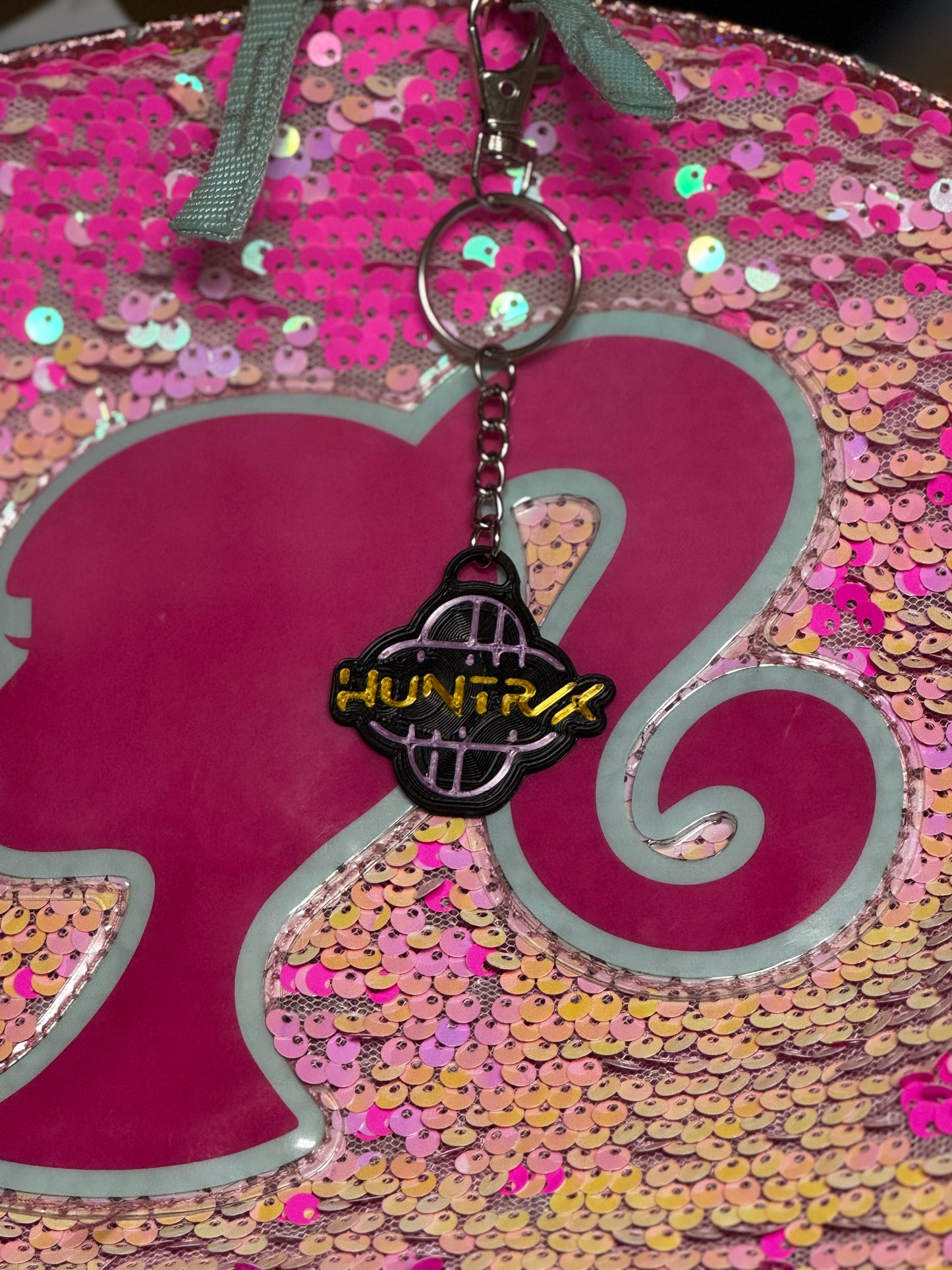 HUNTRX Acrylic Keychain – Purple & Gold Logo with Holographic Back
